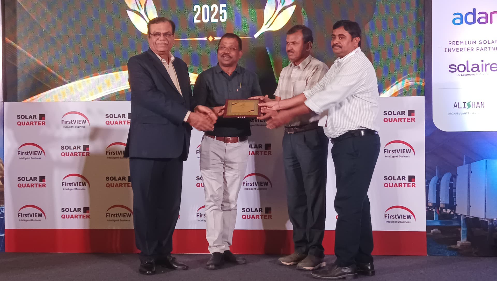 P. Venkat Reddy receiving an industry recognition plaque